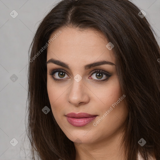 Joyful white young-adult female with long  brown hair and brown eyes