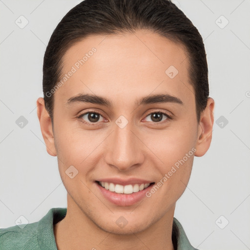 Joyful white young-adult female with short  brown hair and brown eyes