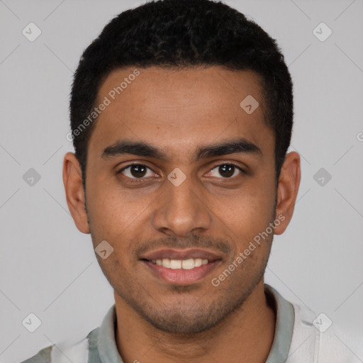 Joyful latino young-adult male with short  brown hair and brown eyes