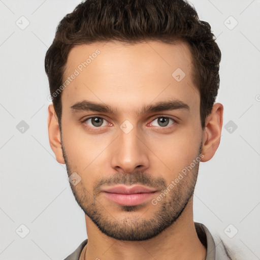 Neutral white young-adult male with short  brown hair and brown eyes