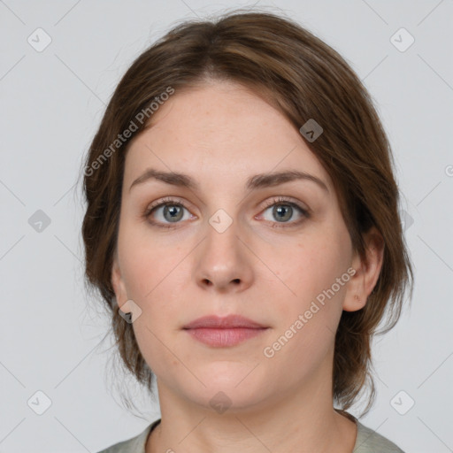 Neutral white young-adult female with medium  brown hair and grey eyes