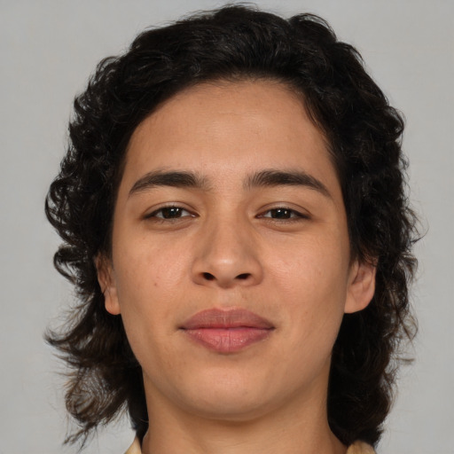 Joyful asian young-adult male with medium  brown hair and brown eyes