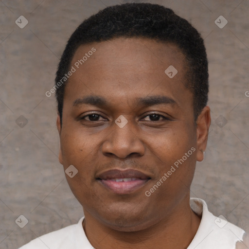 Joyful black young-adult male with short  black hair and brown eyes