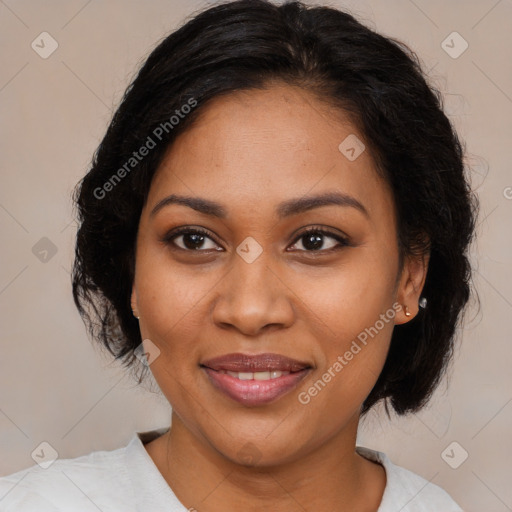 Joyful black adult female with medium  brown hair and brown eyes