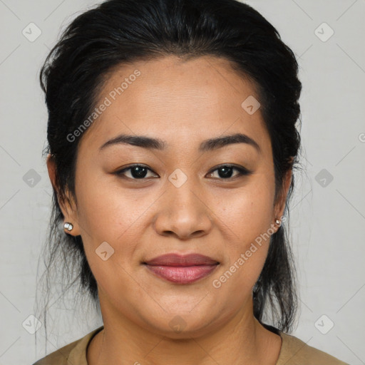 Joyful asian young-adult female with medium  black hair and brown eyes