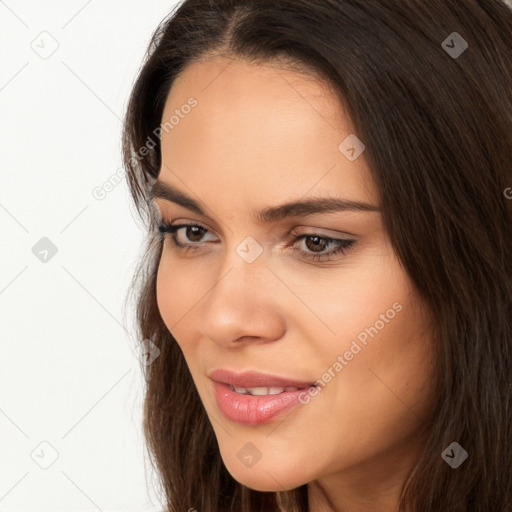 Neutral white young-adult female with long  brown hair and brown eyes