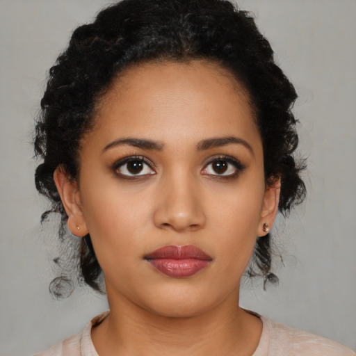 Neutral latino young-adult female with medium  black hair and brown eyes