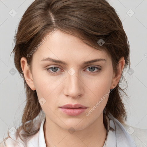 Neutral white young-adult female with medium  brown hair and grey eyes