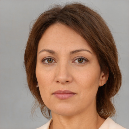 Neutral white adult female with medium  brown hair and brown eyes