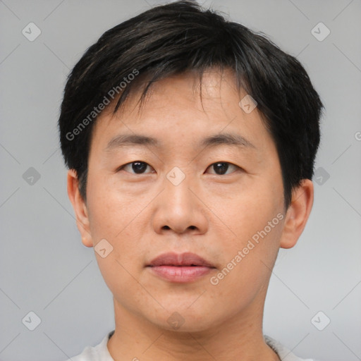 Neutral asian young-adult male with short  black hair and brown eyes