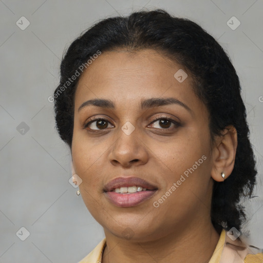 Joyful latino young-adult female with medium  brown hair and brown eyes