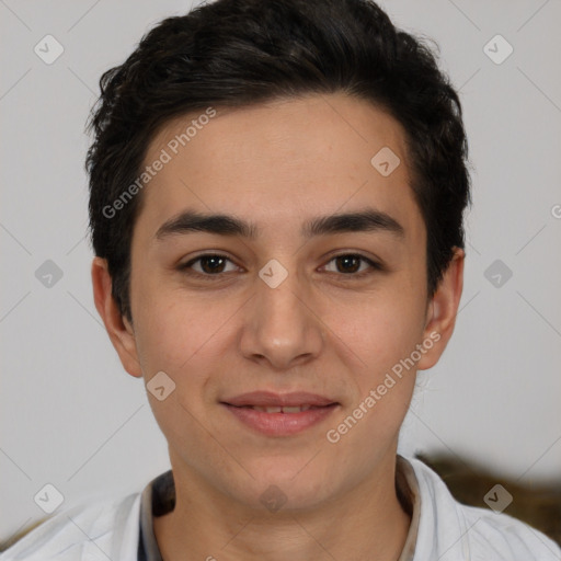 Joyful white young-adult male with short  black hair and brown eyes