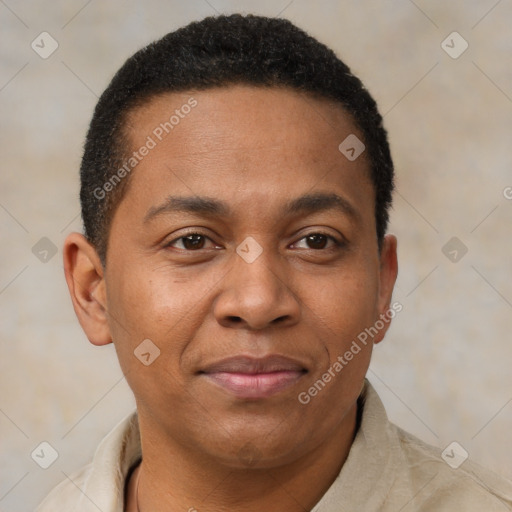 Joyful latino young-adult male with short  brown hair and brown eyes