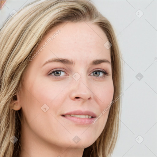 Joyful white young-adult female with long  brown hair and blue eyes