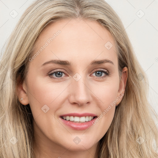 Joyful white young-adult female with long  brown hair and grey eyes