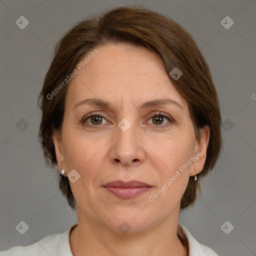 Joyful white adult female with medium  brown hair and grey eyes