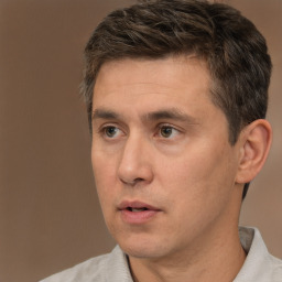 Neutral white adult male with short  brown hair and brown eyes