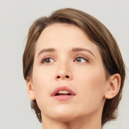 Neutral white young-adult female with medium  brown hair and grey eyes