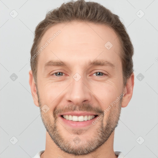 Joyful white young-adult male with short  brown hair and brown eyes