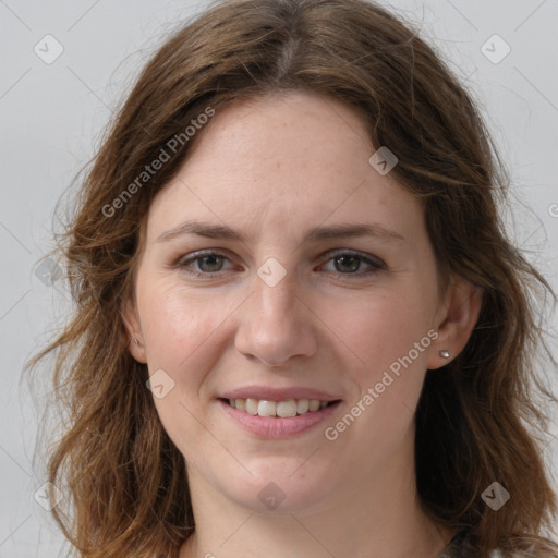 Joyful white young-adult female with long  brown hair and grey eyes