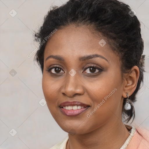 Joyful black young-adult female with medium  brown hair and brown eyes