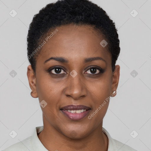 Joyful black young-adult female with short  brown hair and brown eyes