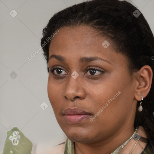 Neutral black young-adult female with short  black hair and brown eyes