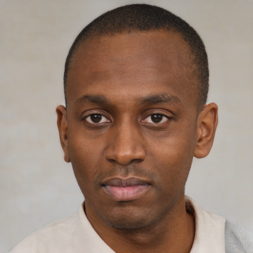 Neutral black young-adult male with short  brown hair and brown eyes
