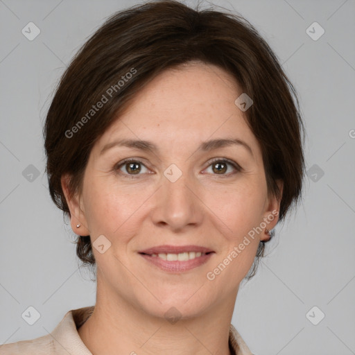 Joyful white adult female with medium  brown hair and grey eyes