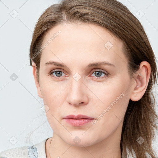 Joyful white young-adult female with medium  brown hair and blue eyes