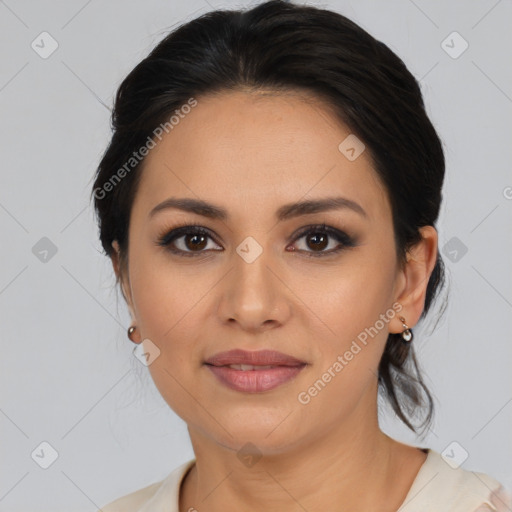 Joyful latino young-adult female with medium  brown hair and brown eyes