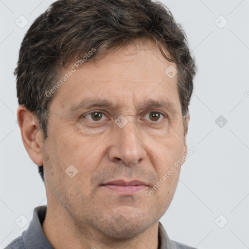 Neutral white middle-aged male with short  brown hair and brown eyes