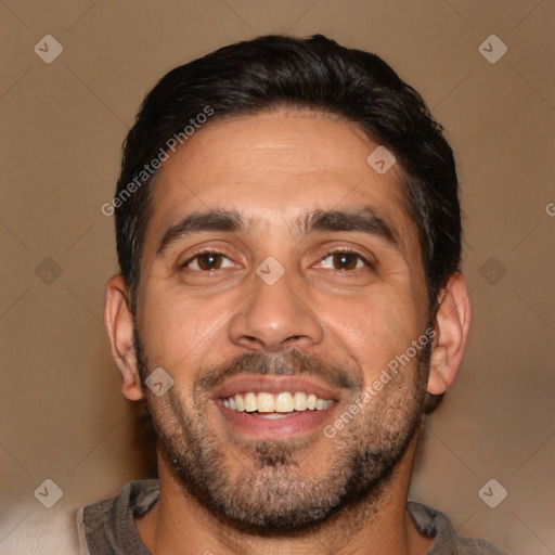 Joyful white adult male with short  black hair and brown eyes