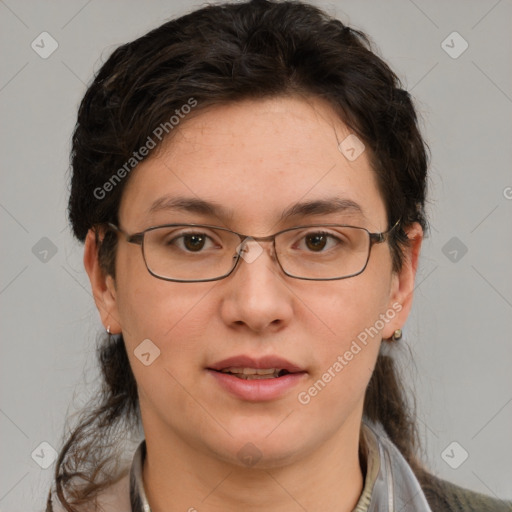 Joyful white adult female with short  brown hair and brown eyes