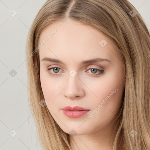 Neutral white young-adult female with long  brown hair and brown eyes