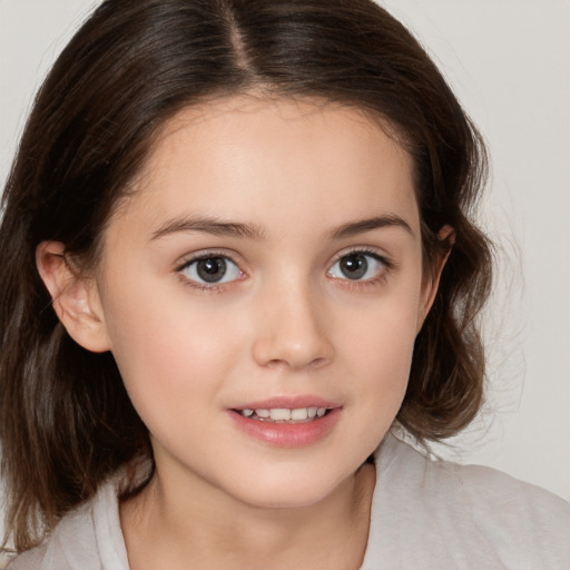 Joyful white child female with medium  brown hair and brown eyes