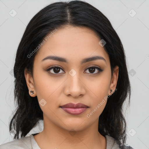 Joyful latino young-adult female with medium  black hair and brown eyes