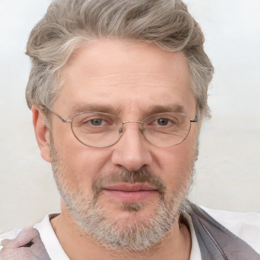 Joyful white middle-aged male with short  brown hair and grey eyes