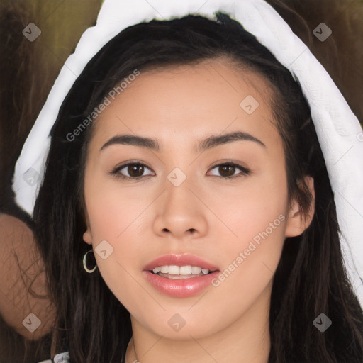 Joyful asian young-adult female with long  brown hair and brown eyes