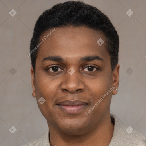 Joyful black young-adult male with short  black hair and brown eyes