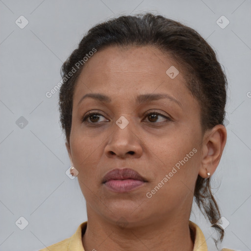 Neutral black adult female with short  brown hair and brown eyes