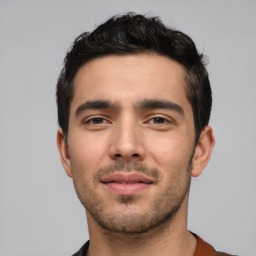 Neutral white young-adult male with short  black hair and brown eyes