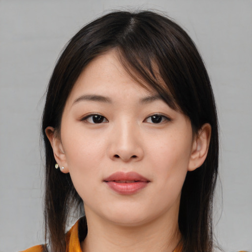 Neutral asian young-adult female with medium  brown hair and brown eyes