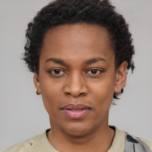 Neutral black young-adult female with short  black hair and brown eyes