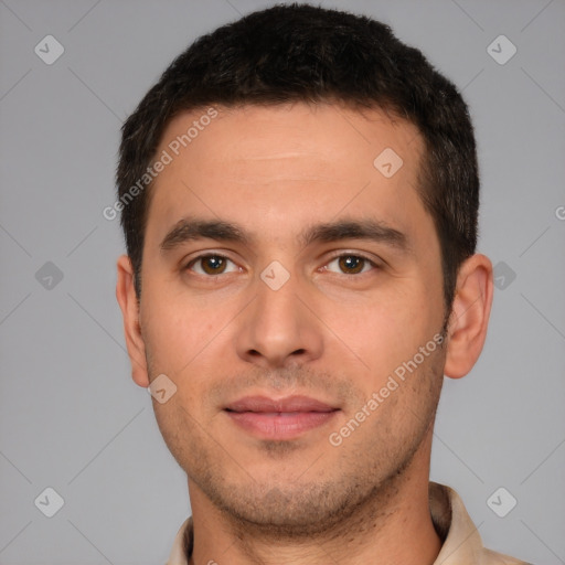 Joyful white young-adult male with short  brown hair and brown eyes