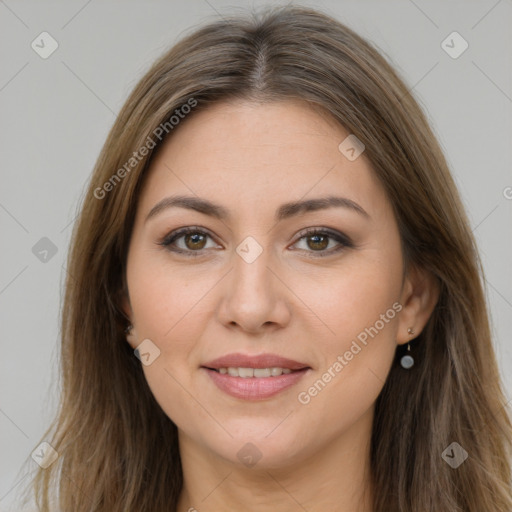 Joyful white young-adult female with long  brown hair and brown eyes