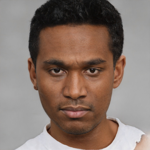 Neutral black young-adult male with short  black hair and brown eyes