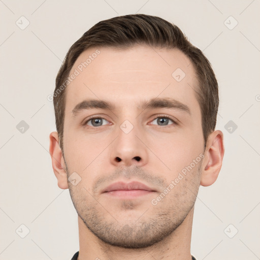 Neutral white young-adult male with short  brown hair and grey eyes