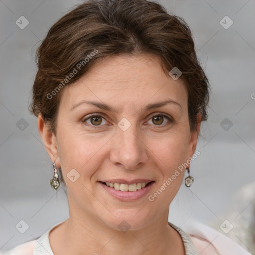 Joyful white adult female with short  brown hair and grey eyes