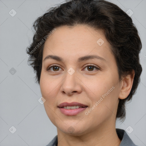 Joyful white adult female with short  brown hair and brown eyes